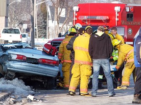 Fire, ambulance and police attend a two-vehicle crash in Sombra on Friday afternoon. At least one person was taken away by ambulance.