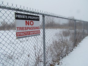 Fence at the Holmes Foundry site.  PAUL MORDEN/THE OBSERVER/QMI AGENCY