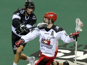 The rush and Roughnecks met in the West final last season, but both are at the bottom of the league heading into Saturday's game. (QMI Agency file)