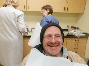 Dan Taylor shows his winning smile at the Evangel Hall Mission Dental Clinic on  Jan. 19, 2015. (Stan Behal/Toronto Sun)