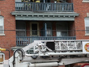 Emergency crews were at the scene of a small apartment fire at the four-storey Prince Rupert apartments on O'Connor Street in the Glebe, just south of Second Avenue on Saturday, Jan. 24, 2015. There were no injuries reported and damage has been pegged at around $10,000. The fire reportedly started on the balcony. 
Chris Hofley/Ottawa Sun/QMI AGENCY