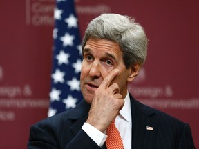 U.S. Secretary of State John Kerry gestures during a press conference at the Foreign and Commonwealth Office in London January 22, 2015. The U.S.-led coalition could take up to two years to expel Islamic State from Iraq, and Baghdad's own forces will be incapable of proper combat operations for months, Britain's foreign minister warned on Thursday. REUTERS/Stefan Wermuth