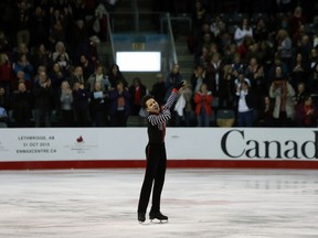 Nam Nguyen of Toronto, representing central Ontario, competes in the senior men's free program at the Canadian Tire National Skating Championships at the Rogers K-Rock Centre in Kingston, Ont. on Saturday January 24, 2015. Steph Crosier/Kingston Whig-Standard/QMI Agency