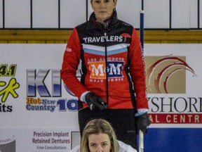 Skips Julie Hastings (front) and Sherry Middaugh monitor a rock’s progress down the sheet during the Page 1-2 playoff game at the Ontario Scotties Tournament of Hearts last night. (marjdubeauphotography.com)