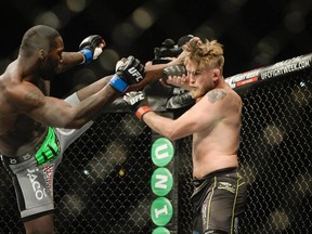 Anthony 'Rumble' Johnson (L) of the U.S. fights with Alexander 'The Mauler' Gustafsson of Sweden in their UFC light heavyweight mixed martial arts bout at Tele2 Arena in Stockholm January 24, 2015. REUTERS/Jessica Gow/TT News Agency