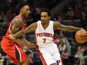Detroit Pistons guard Brandon Jennings (7) dribbles the ball as Atlanta Hawks guard Jeff Teague (0) defends during the first half at Philips Arena. (Dale Zanine-USA TODAY Sports)