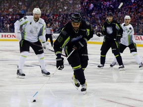 Dutin Byfuglien managed one assist at the All-Star Game. (RUSSELL LABOUNTY/USA Today Sports)