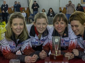 Julie Hastings (left) and members of her team waited more than 20 years for this moment: Posing with the trophy after winning the 2015 Ontario Scotties Tournament of Hearts curling event. (marjdubeauphotography.com)