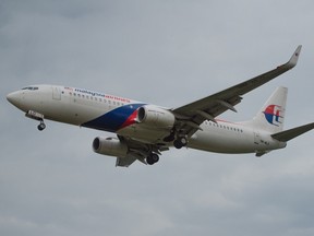 Malaysia Airlines plane preparing for landing at Kuala Lumpur International Airport (KLIA) in Sepang, outside Kuala Lumpur.

AFP PHOTO / MOHD RASFAN