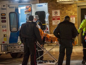 A 19-year-old man was rushed to hospital with gunshot wounds to his chest after a shooting at 145 Neptune Dr. late Sunday. (VICTOR BIRO/Special to the Toronto Sun)
