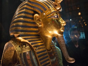 The mask of King Tutankhamun, which was found to have been damaged and glued back together, is seen at the Egyptian Museum in Cairo January 24, 2015. REUTERS/Staff