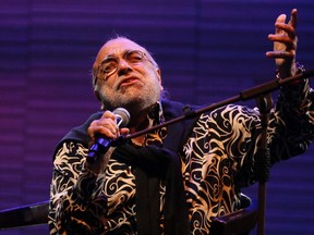 Greek singer Demis Roussos performs at the Edineyat international festival in Ehden town, northern Lebanon August 10, 2013. REUTERS/Jamal Saidi