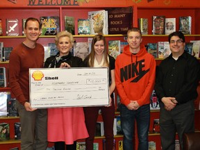 Shell Canada gave $10,000 to Sarnia's Northern Collegiate on Jan. 21, in order to purchase new furniture to create additional study areas in the school's library. From left to right: Shell Canada's Randy Provencal, library supervisor Mary Jo Koch, student co-presidents Olivia Musico and Calumn Dietzel and Northern Collegiate Principal Gary Girardi.
CARL HNATYSHYN/SARNIA THIS WEEK/QMI AGENCY