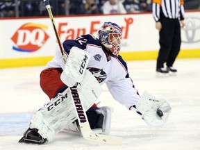 Columbus Blue Jackets goalie Sergei Bobrovsky makes a save during the second period against the Winnipeg Jets at MTS Centre on Jan. 21, 2015. (Bruce Fedyck/USA TODAY Sports)