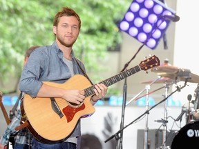 Phillip Phillips performs on NBC's "Today" at the NBC's TODAY Show on June 27, 2014 in New York, New York.  Jamie McCarthy/Getty Images/AFP