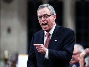 Finance Minister Joe Oliver speaks during Question Period in the House of Commons on Parliament Hill in Ottawa, Jan. 26, 2015. (CHRIS WATTIE/Reuters)