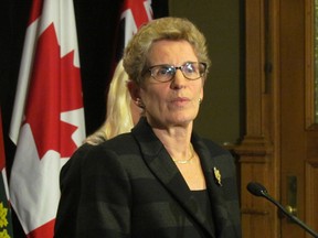 Premier Kathleen Wynne at Queen's Park on Monday, Jan. 26, 2015, says she welcomes Elections Ontario investigation into allegations her party offered a would-by Sudbury byelection candidate a job or appointment not to run. (Antonella Artuso/Toronto Sun)