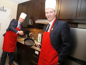 Brad, left, and Ryan Williams, vice-presidents of Williams Hotels, show off the kitchen in one of the suites at the brand-new TownePlace Suites by Marriott which officially opened for business Monday, Jan. 26, 2015. 
Emily Mountney-Lessard/The Intelligencer/QMI Agency