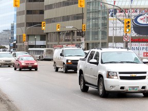 Traffic moves through the intersection of Portage and Main. (Brian Donogh/Winnipeg Sun)