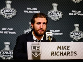 Mike Richards of the Los Angeles Kings speaks to the media at a press conference following Game 3 of the 2014 Stanley Cup Final against the New York Rangers at Madison Square Garden on June 9, 2014. (Jim McIsaac/Getty Images/AFP)