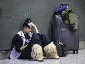 Danielle Polanco, 29, a dance teacher from New York is stuck at Toronto Pearson airport on Monday, January 26, 2015 as all flights into New York were cancelled due to a major snowstorm. (Craig Robertson/Toronto Sun)