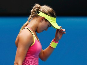 Eugenie Bouchard reacts after losing a point to Maria Sharapova during their quarterfinal match at the Australian Open in Melbourne on Tuesday, Jan. 27, 2015. (Thomas Peter/Reuters)