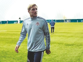 Defender Damien Perquis walks off the field during the first day of practice on Monday. Perquis is one of several moves made by TFC in a big revamp of the club.