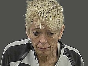 Cynthia Anderson is accused of drowning a doberman puppy in a Nebraska airport toilet. (QMI Agency/Hall County Department of Corrections)