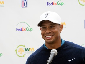 Tiger Woods reacts during his media press conference after a practice round at TPC Scottsdale Stadium Course. (Allan Henry-USA TODAY Sports)