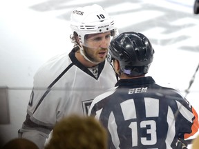 Los Angeles Kings center Mike Richards questions referee Dan O'Halloran about the game winning goal scored by the Philadelphia Flyers during the overtime period at Wells Fargo Center on Oct. 28, 2014. (Eric Hartline/USA TODAY Sports)
