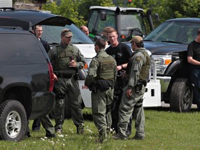 A pair of Ottawa police officers and two paramedics were hurt in a joint training exercise in the city's west end on June 18, 2014. The accident happened around 10:30 a.m. Wednesday on a property along the 900 block of March Rd. near Maxwell Bridge. Tony Caldwell/Ottawa Sun/QMI Agency