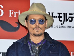 Johnny Depp at the 'Mortdecai' Tokyo photocall at the Peninsula Tokyo Jan. 28, 2015. (WENN)