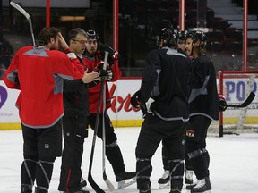 Ottawa Senators coach Dave Cameron going over a power play drill with some of his players during practice at the Canadian Tire Centre in Ottawa Wednesday Jan 28,  2015.   Tony Caldwell/Ottawa Sun/QMI Agency