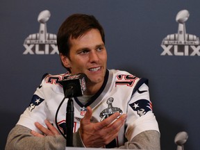 New England Patriots quarterback Tom  Brady (12) answers questions during a press conference at Chandler Wild Horse Pass. (Matthew Emmons-USA TODAY Sports)