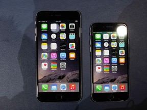 The iPhone 6 and the iPhone 6 Plus are shown during an Apple event at the Flint Center in Cupertino, Calif., Sept. 9, 2014. REUTERS/Stephen Lam
