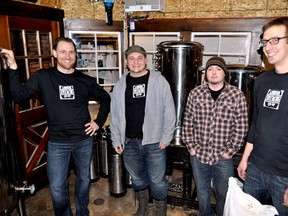 London Brewing Co-operative worker-owners David Thuss (left), Jeff Pastorius, Aaron Lawrence and Joel Pastorius at their modest brewing location inside The Root Cellar on Dundas Street Jan. 27, 2015. CHRIS MONTANINI\LONDONER\QMI AGENCY
