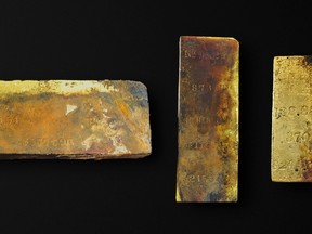 Five gold bars, totaling approximately 1,000 ounces are shown in this April 2014 handout photo provided by Odyssey Marine Explorations Inc., May 5, 2014. They were salvaged during Odyssey's first reconnaissance dive to the SS Central America shipwreck site, which lies 2,200 metres deep and 260 km off the coast of South Carolina. (Odyssey Marine Explorations/Handout via Reuters)