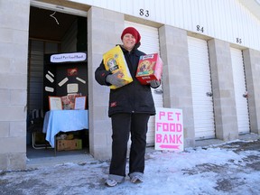Sheri Koekman stands outside the pet food bank she opened recently. Open on Wednesdays from noon to 3 p.m., the pet food bank operates out of one of the storage units at 127 River Street in Tweed. 
Emily Mountney-Lessard/The Intelligencer