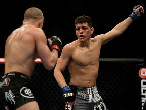 Nick Diaz battles Georges St. Pierre during UFC 158 at the Bell Centre on March 17, 2013. (MARTIN CHEVALIER/LE JOURNAL DE MONTRÉAL/QMI AGENCY)