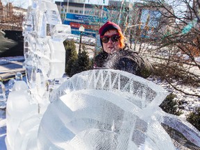 Latvian ice sculpture Maija Puncule works on her art at Confederation Park in Ottawa in advance of this weekends opening of Winterlude. January 28, 2015. Errol McGihon/Ottawa Sun/QMI Agency
