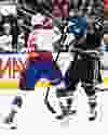 Edmonton's Ashton Sautner collides with Kelowna's Madison Bowey during the first period of the Edmonton Oil Kings' WHL hockey game against the Kelowna Rockets at Rexall Place in Edmonton, Alta., on Wednesday, Jan. 28, 2015. Codie McLachlan/Edmonton Sun/QMI Agency