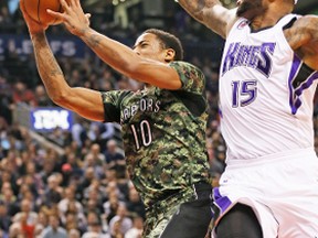 DeMar DeRozan drives past Kings' DeMarcus Cousins during Wednesday night's 119-102 Raptors win over the Kings at the ACC. (STAN BEHAL,Toronto Sun)