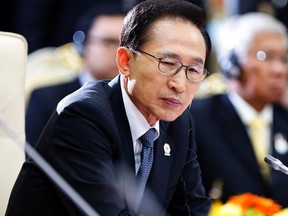 Former South Korean President Lee Myung-bak attends the 21st ASEAN (Association of Southeast Asian Nations) and East Asia summits in Phnom Penh in this November 19, 2012 file photo. REUTERS/Samrang Pring/Files