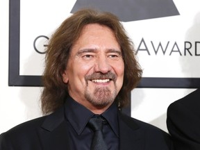 Geezer Butler from the heavy metal band Black Sabbath arrives at the 56th annual Grammy Awards in Los Angeles, California January 26, 2014.    REUTERS/Danny Moloshok