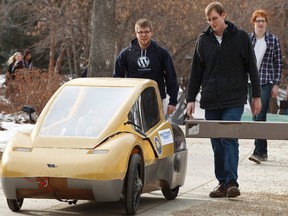 The EcoCar, driven by Salma Emallah, is seen at the University of Alberta in Edmonton, Alta., in 2014, before completing in that year's Shell Eco-marathon in Houston. This year's marathon is being held at Detroit's Cobo Hall in April. (File photo)