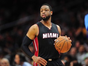 Miami Heat guard Dwyane Wade (3) moves the ball up court against the Los Angeles Clippers during the first half at Staples Center. (Gary A. Vasquez-USA TODAY Sports)