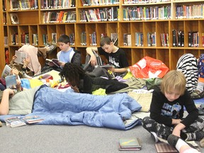 Students from R.G. Sinclair Public School fill their library floor during their annual read-a-thon. They spend the day in the library, leaving only for recess and lunch, and donate money to buy new books. (Michael Lea/The Whig-Standard)