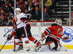 Ottawa Senators center Jean-Gabriel Pageau celebrates after he scored past New Jersey Devils goalie Martin Brodeur (R) in the second period of their NHL hockey game in Newark, New Jersey, April 12, 2013. (REUTERS/Ray Stubblebine)
