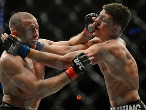 Nick Diaz battles George St. Pierre during UFC 158 at the Bell Centre on March 17, 2013. (MARTIN CHEVALIER/LE JOURNAL DE MONTRÉAL /QMI AGENCY)