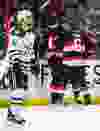 Ottawa Senators' Mika Zibanejad celebrates his goal with teammate Bobby Ryan as Dallas Stars' Tyler Seguin skates by during NHL hockey action at the Canadian Tire Centre in Ottawa, Ontario on January 29, 2015. Errol McGihon/Ottawa Sun/QMI Agency